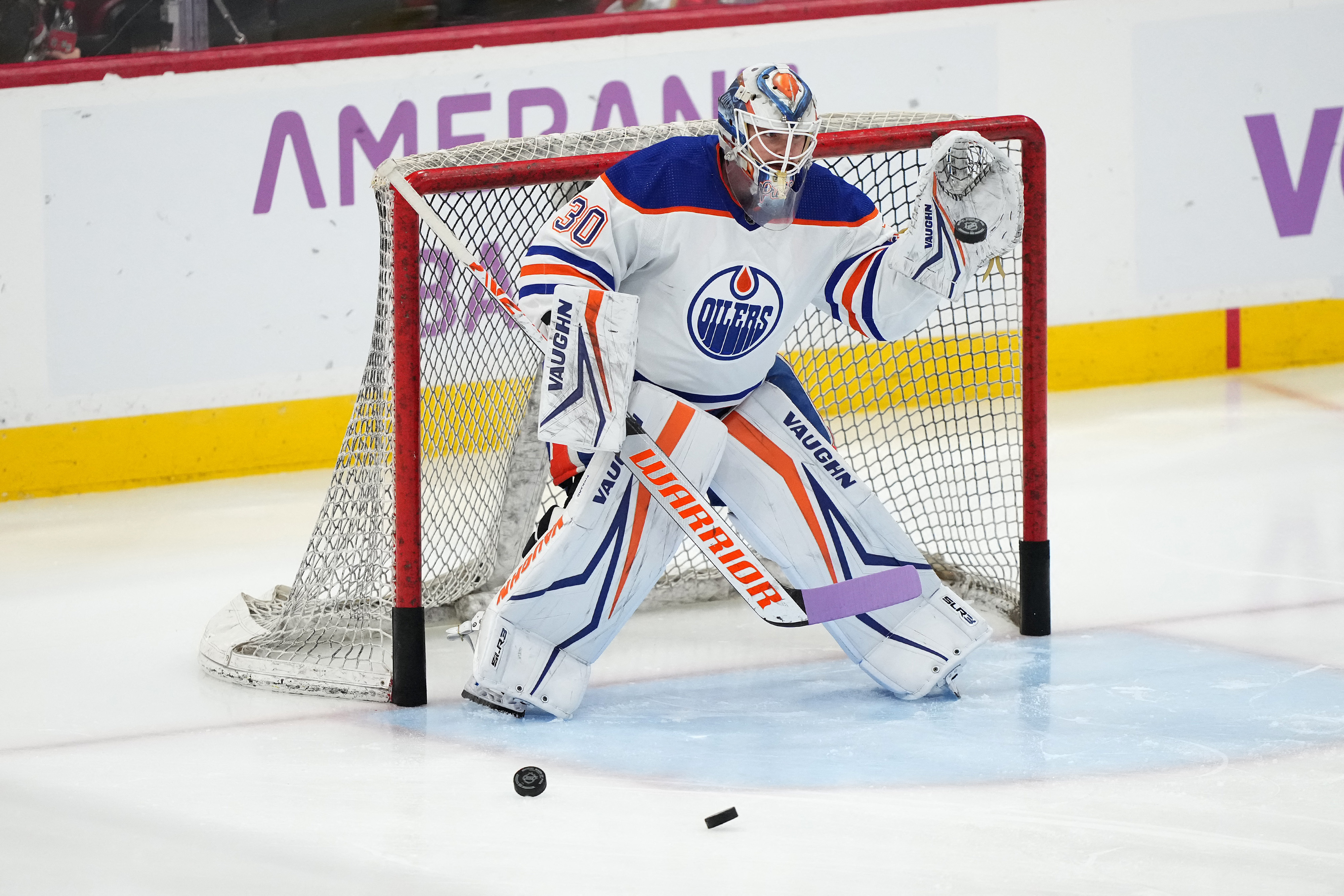 First Nhl Goalie to Score a Goal: Tracing Hockey Milestones  